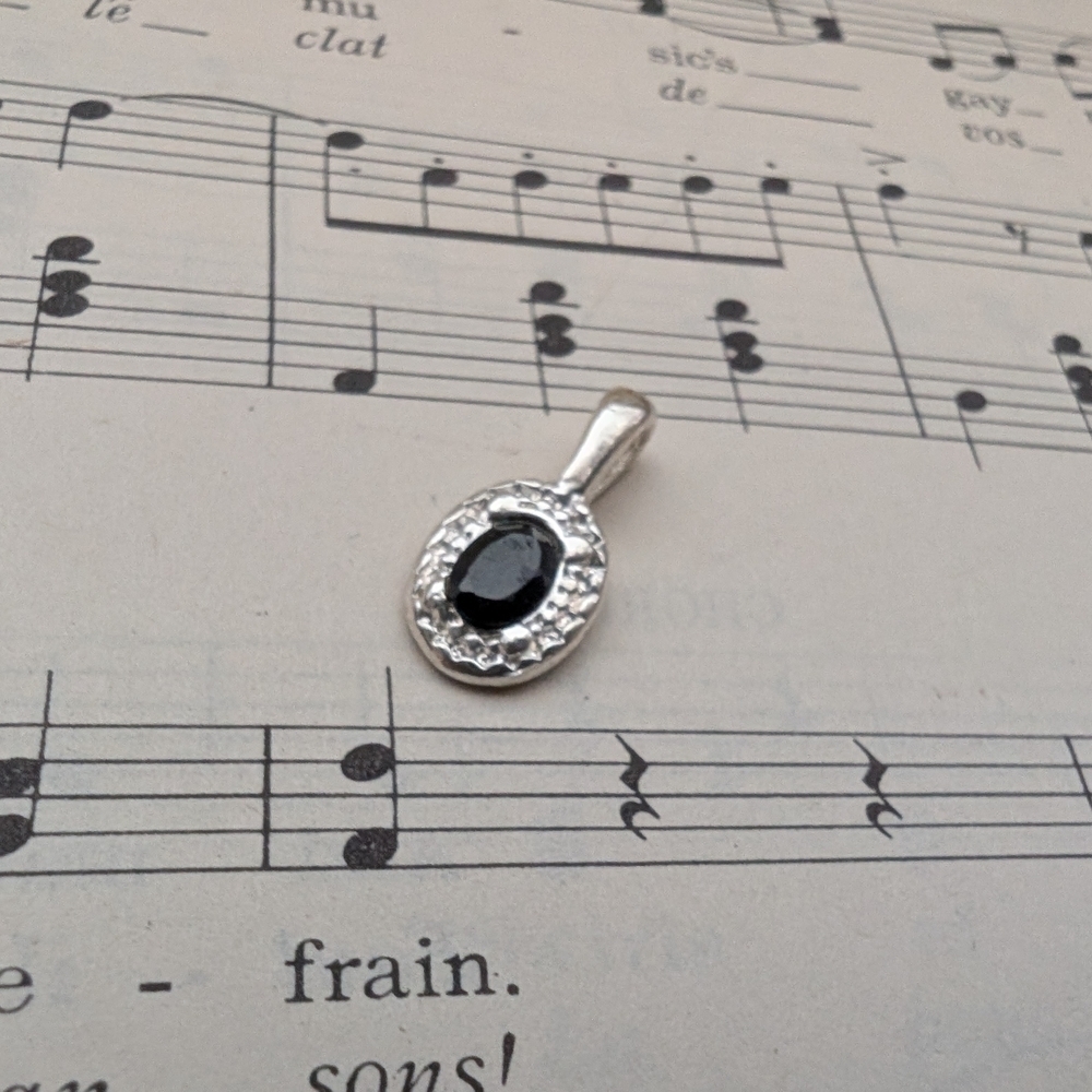 Elegant Silvertone and Black Pendant